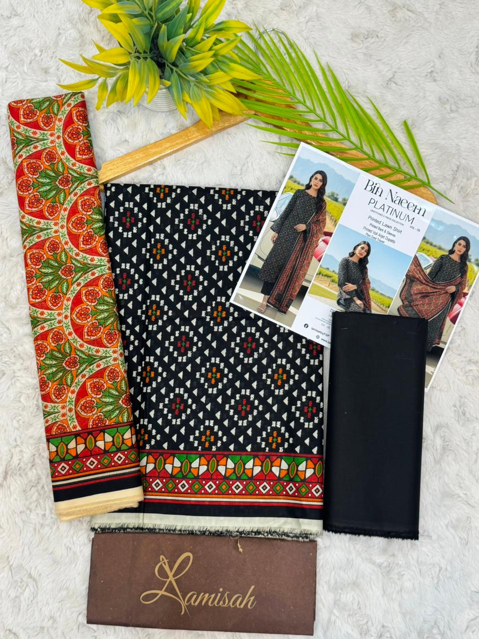Bin Naeem Platinum black red and green printed lawn suit for women with printed dupatta and dyed trouser