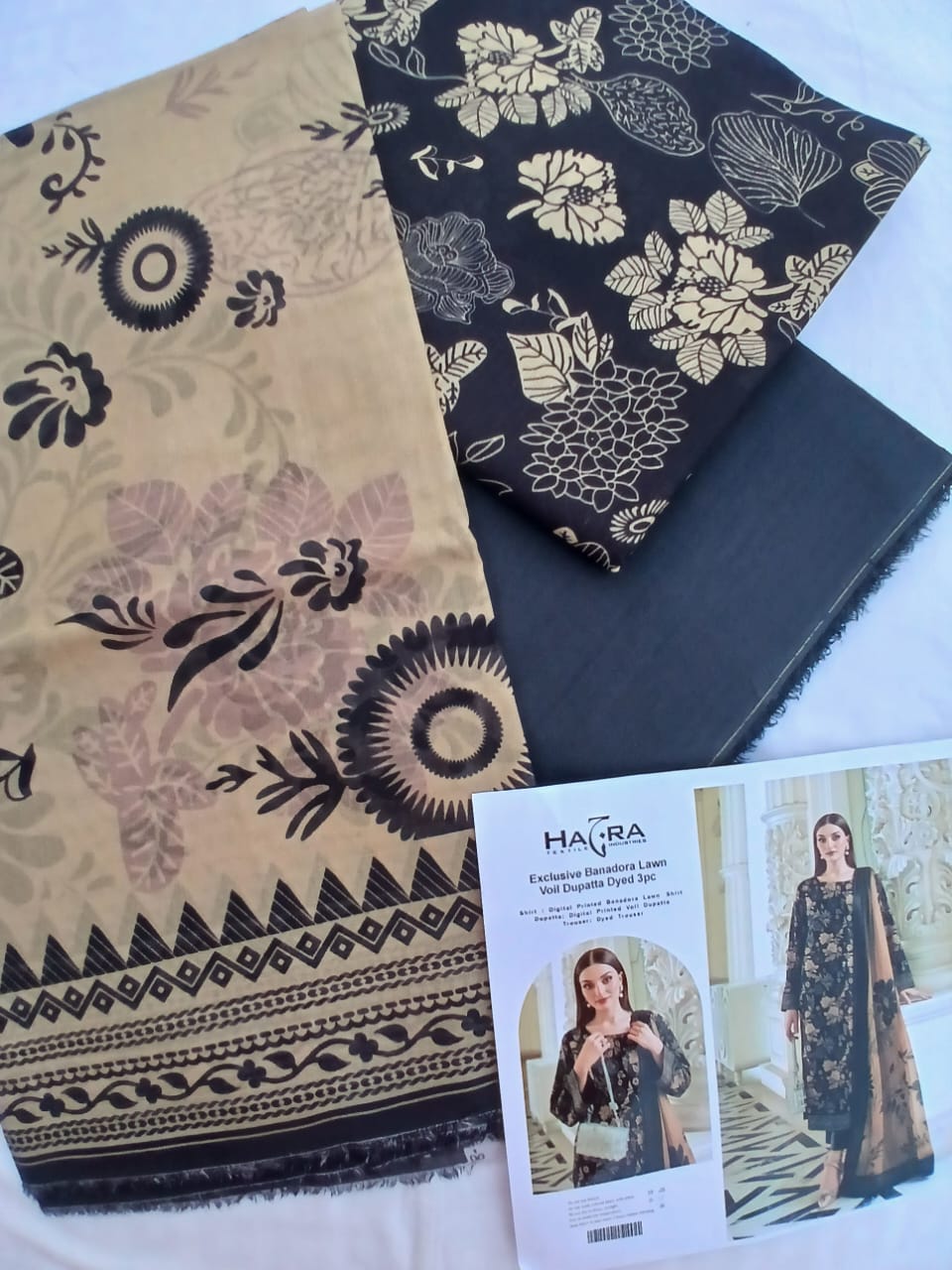 Professional flat lay of shirt, trouser, and dupatta pieces.