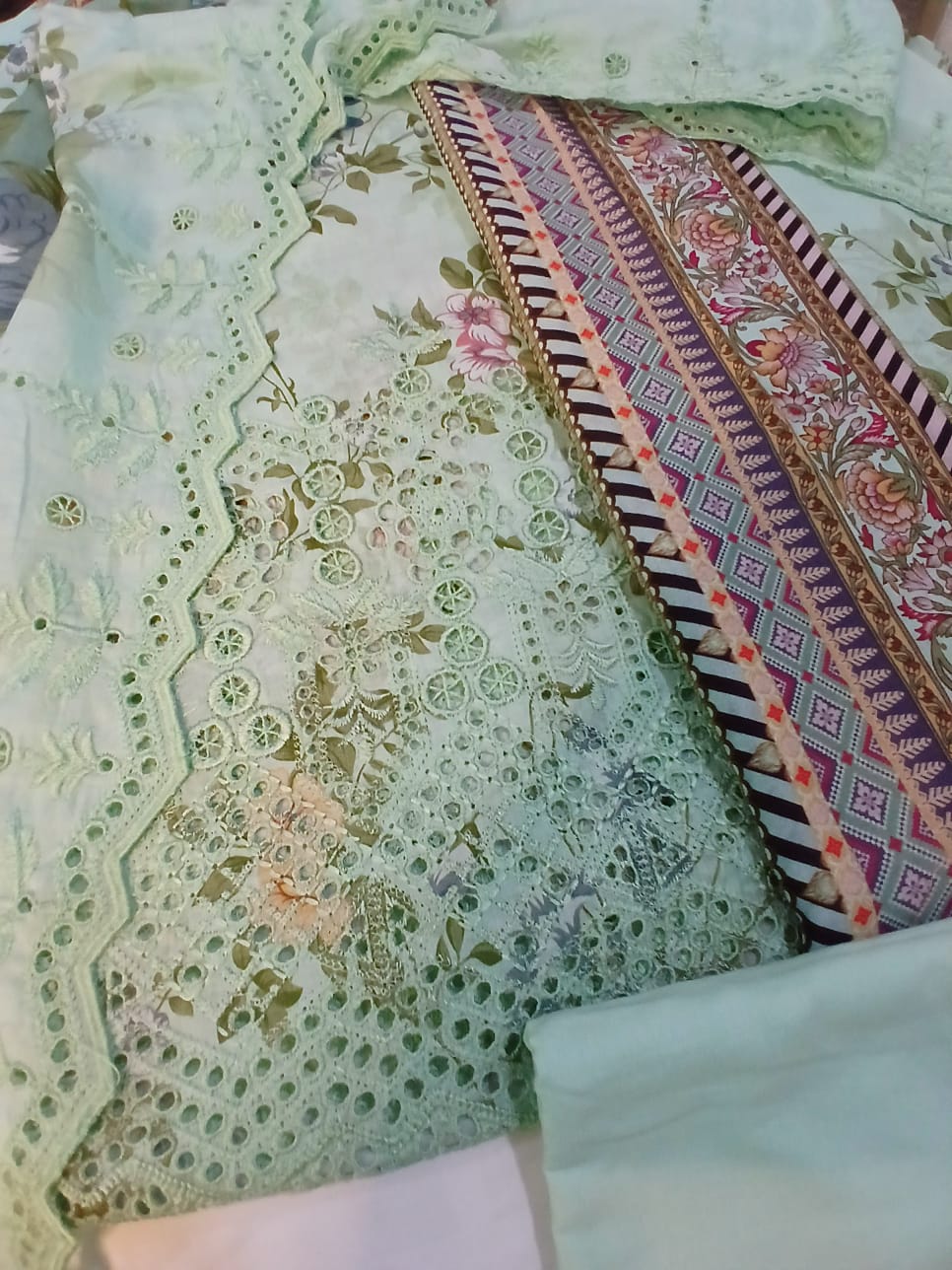 Comfortable cambric trousers in pastel green color for embroidered lawn suit set