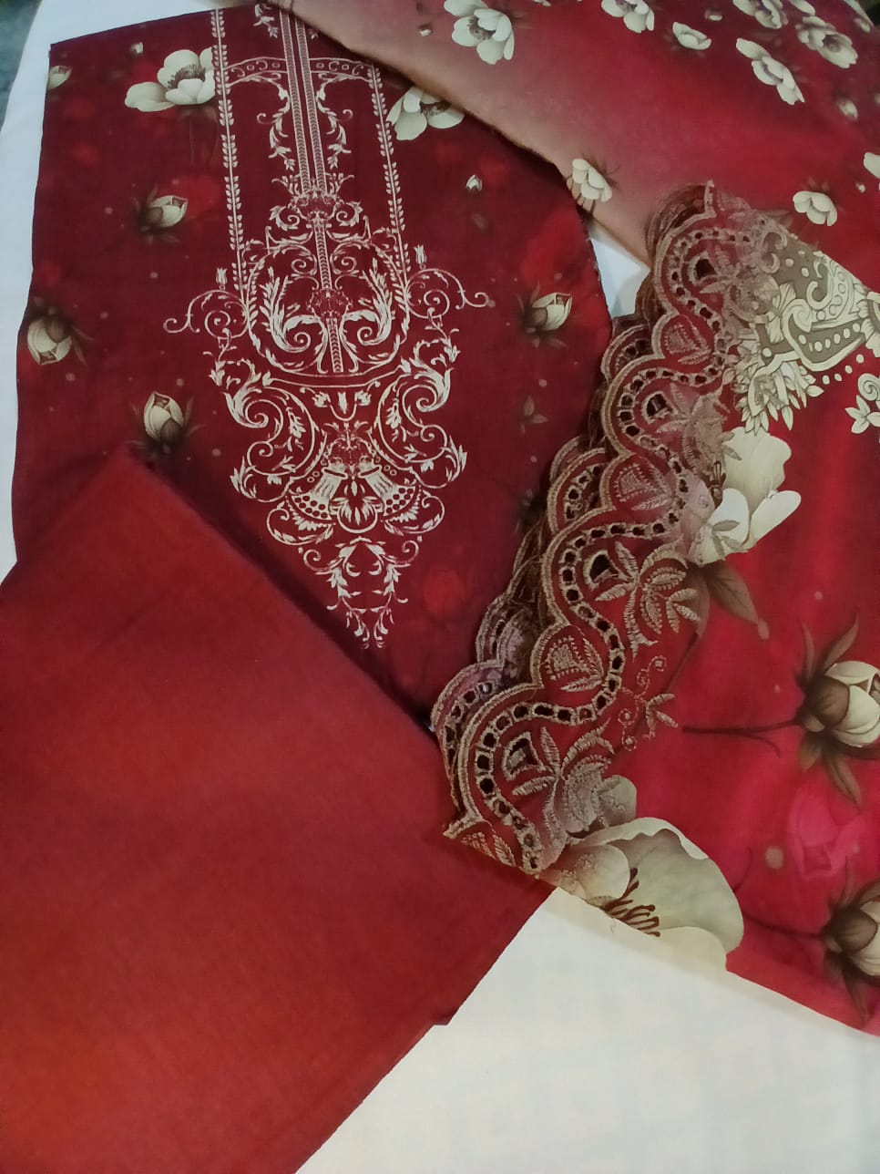 Detailed embroidery and cutwork design on premium burgundy lawn fabric shirt