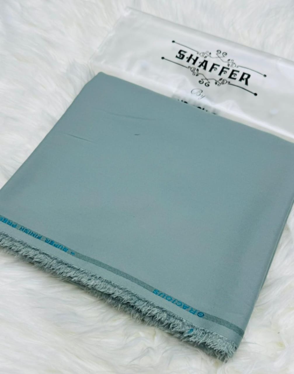 Shaffer By Grace steel blue wash and wear suit fabric