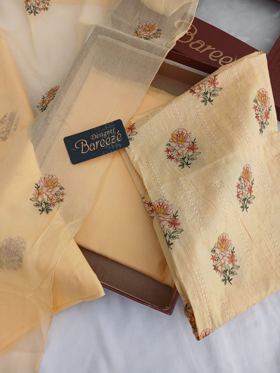 Bareeze inspired cream embroidered lawn suit with embroidered Bamber dupatta by Aladeen Fabrics